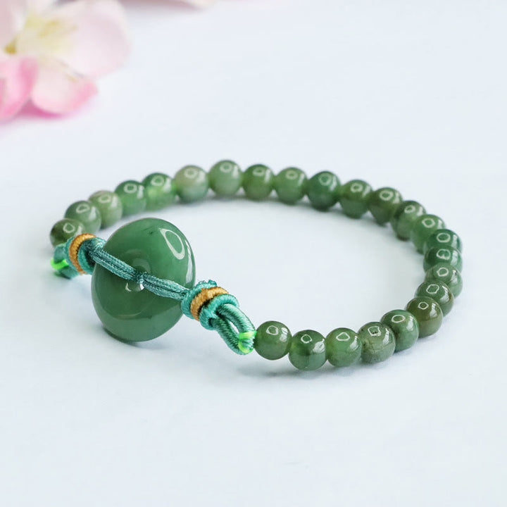 Pulsera de prosperidad con hebilla de paz y cuentas de jade de Buddha Stones