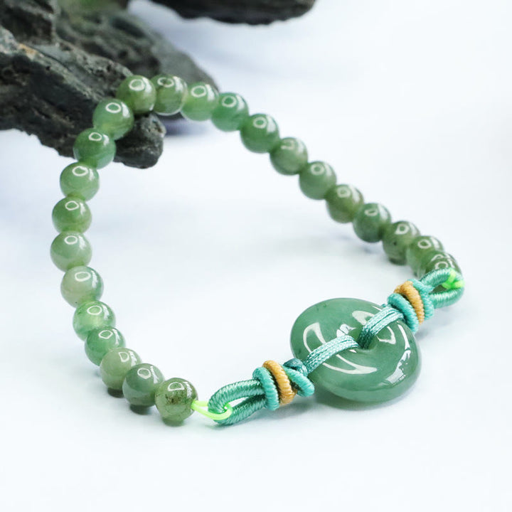 Pulsera de prosperidad con hebilla de paz y cuentas de jade de Buddha Stones
