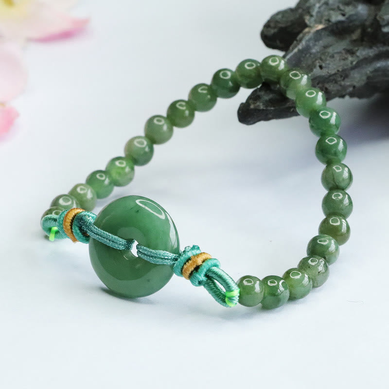 Pulsera de prosperidad con hebilla de paz y cuentas de jade de Buddha Stones