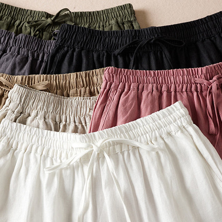 Pantalones harén de lino y algodón con bordado de flores pequeñas de verano con Buddha Stones y bolsillos
