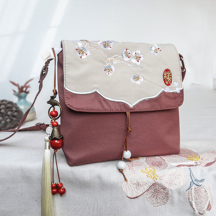 Bolso bandolera de lino y algodón con bordado de Buddha Stones , color marrón liso y ciruela.