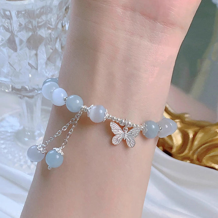Pulsera de soporte con dije de mariposa y aguamarina ojo de gato con Buddha Stones
