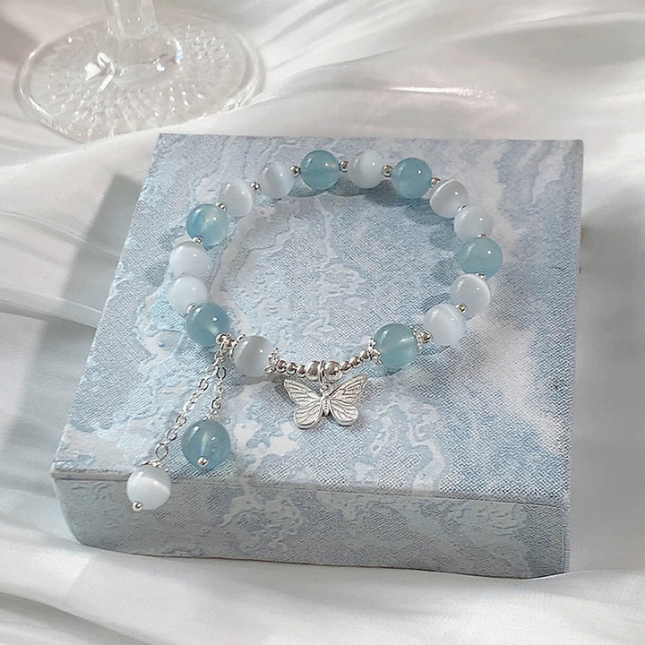 Pulsera de soporte con dije de mariposa y aguamarina ojo de gato con Buddha Stones