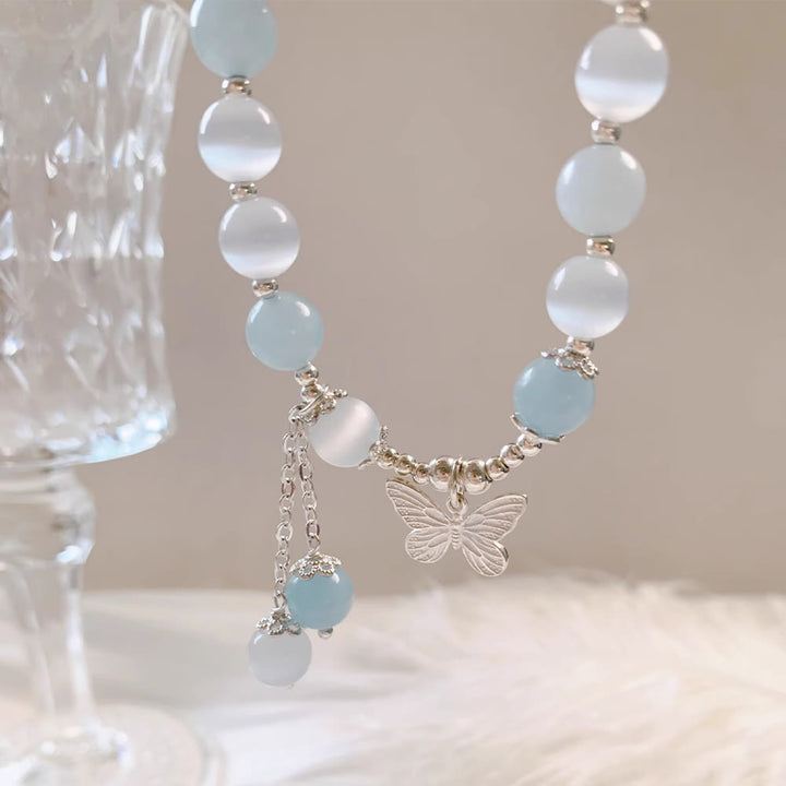 Pulsera de soporte con dije de mariposa y aguamarina ojo de gato con Buddha Stones