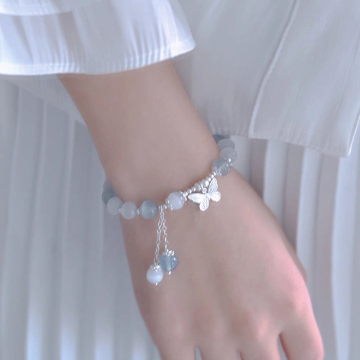Pulsera de soporte con dije de mariposa y aguamarina ojo de gato con Buddha Stones