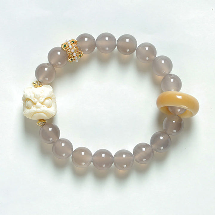 Pulsera de confianza con Buddha Stones, ámbar, ágata gris, marfil y fruta