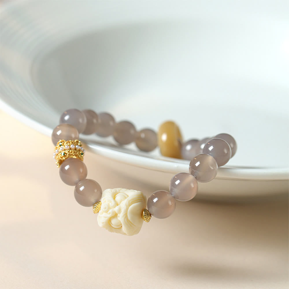 Pulsera de confianza con Buddha Stones, ámbar, ágata gris, marfil y fruta