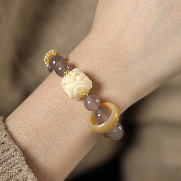 Pulsera de confianza con Buddha Stones, ámbar, ágata gris, marfil y fruta
