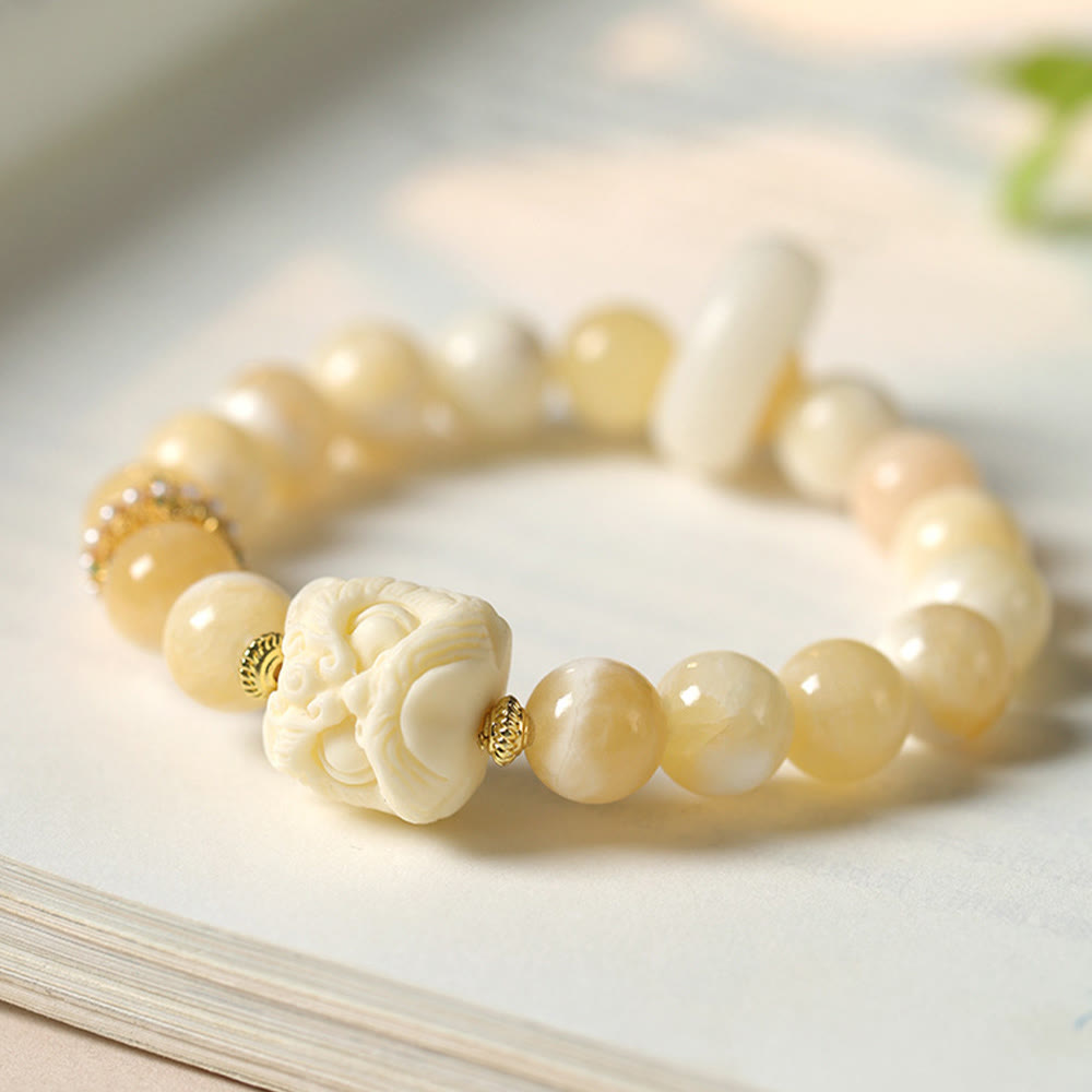 Pulsera de confianza con Buddha Stones, ámbar, ágata gris, marfil y fruta