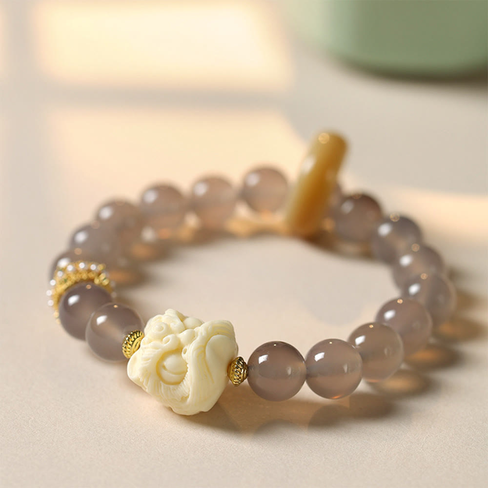 Pulsera de confianza con Buddha Stones, ámbar, ágata gris, marfil y fruta