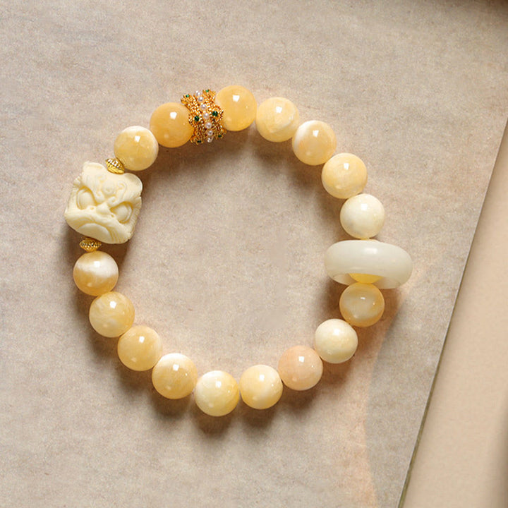 Pulsera de confianza con Buddha Stones, ámbar, ágata gris, marfil y fruta