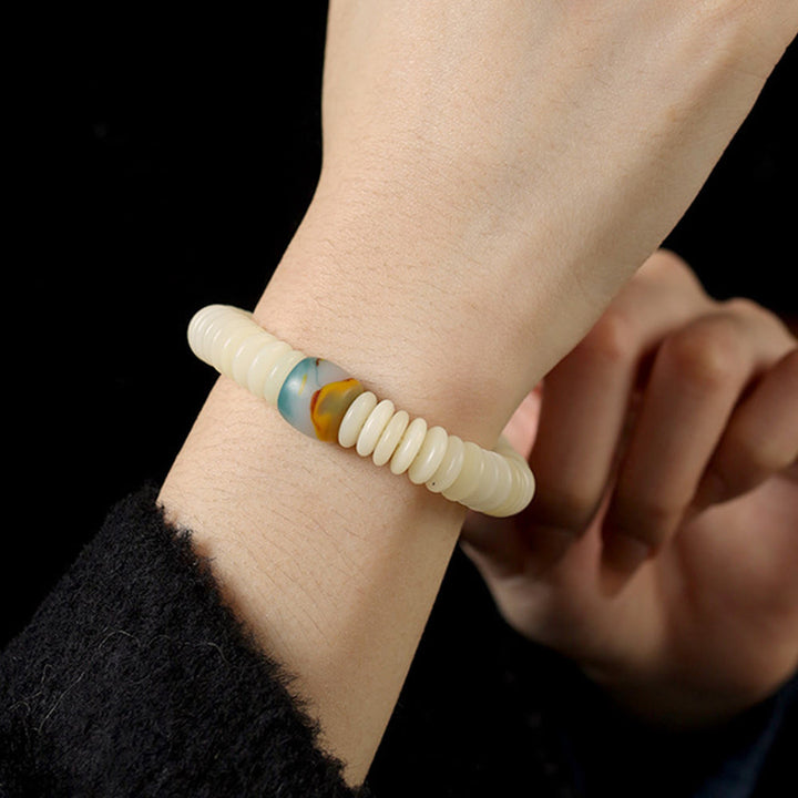 Pulsera Mala con borla de sabiduría y piedra de semilla de Bodhi blanca natural de Buddha Stones