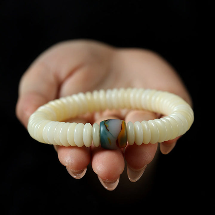 Pulsera Mala con borla de sabiduría y piedra de semilla de Bodhi blanca natural de Buddha Stones