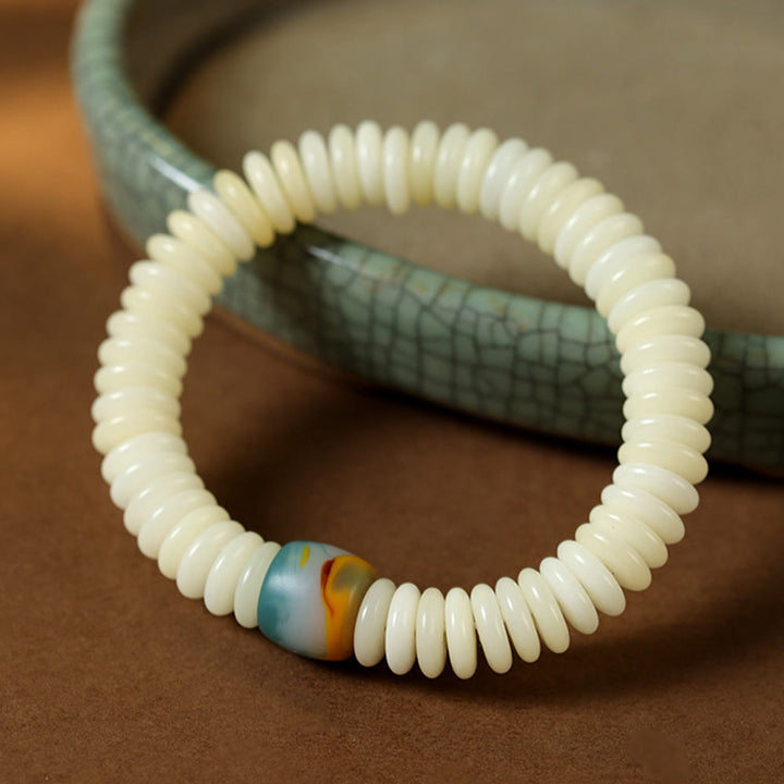 Pulsera Mala con borla de sabiduría y piedra de semilla de Bodhi blanca natural de Buddha Stones