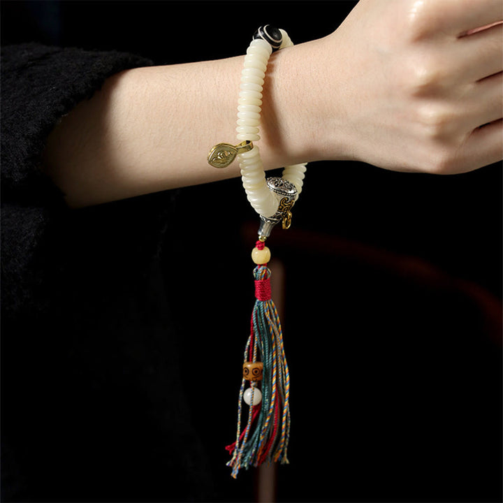 Pulsera Mala con borla de sabiduría y piedra de semilla de Bodhi blanca natural de Buddha Stones