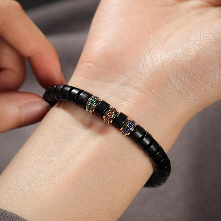 Pulsera de la paz con Buddha Stones, madera de ébano y sándalo rojo con hojas pequeñas y circonitas