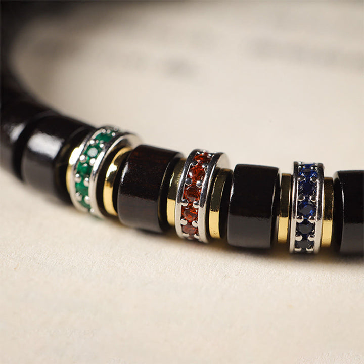 Pulsera de la paz con Buddha Stones, madera de ébano y sándalo rojo con hojas pequeñas y circonitas