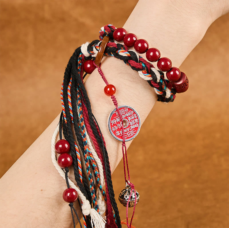 Pulsera de borlas de cuerda roja de doble capa con cinabrio y piedras de Buddha Stones tibetanas que gastan dinero
