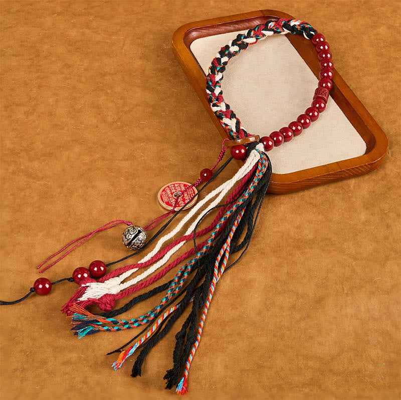 Pulsera de borlas de cuerda roja de doble capa con cinabrio y piedras de Buddha Stones tibetanas que gastan dinero