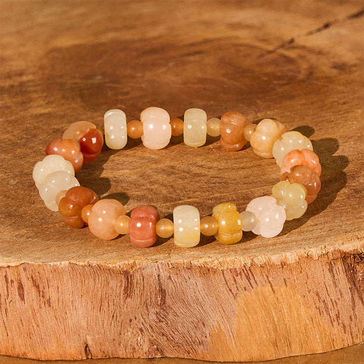 Pulsera de cuentas de calabaza de jade y seda dorada con Buddha Stones para la riqueza y la suerte
