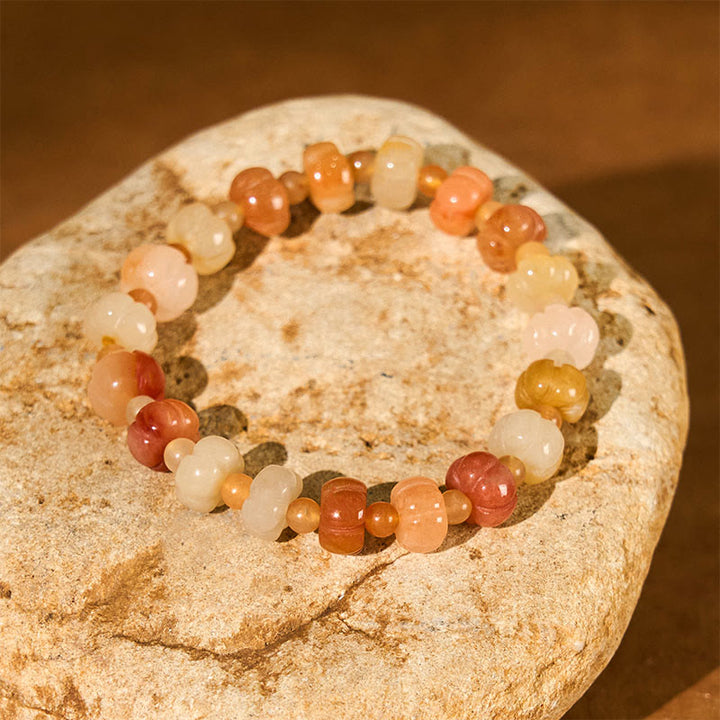 Pulsera de cuentas de calabaza de jade y seda dorada con Buddha Stones para la riqueza y la suerte