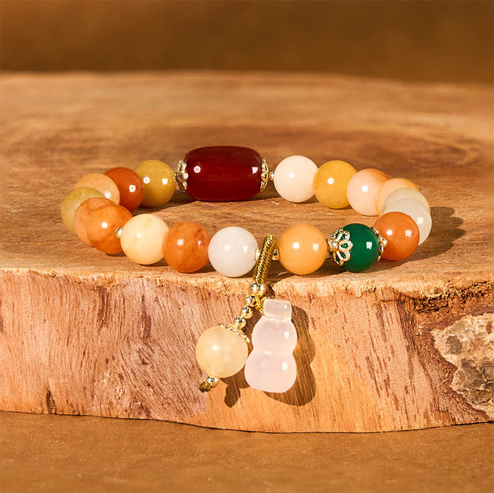 Pulsera de calabaza con cuentas de jade de seda dorada y Buddha Stones para la riqueza y la suerte