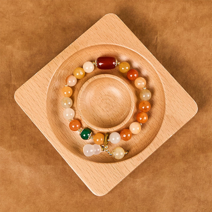 Pulsera de calabaza con cuentas de jade de seda dorada y Buddha Stones para la riqueza y la suerte