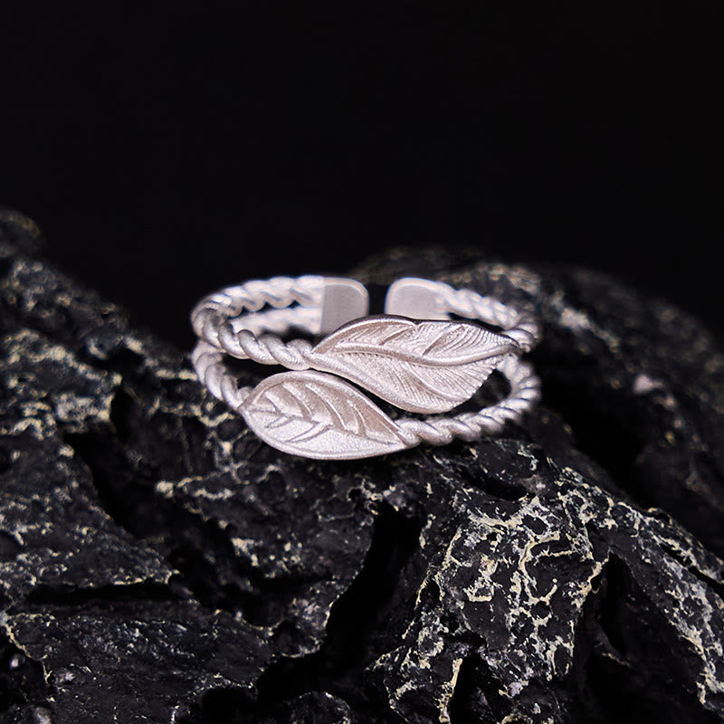 Anillo ajustable de riqueza con hoja de cobre y piedra de Buda