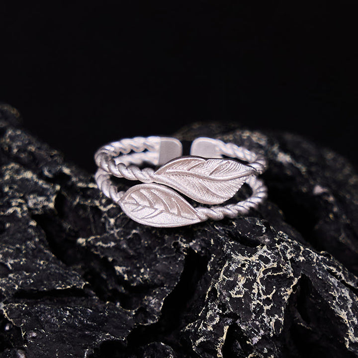 Anillo ajustable de riqueza con hoja de cobre y piedra de Buda