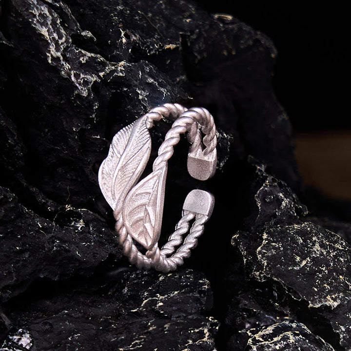 Anillo ajustable de riqueza con hoja de cobre y piedra de Buda