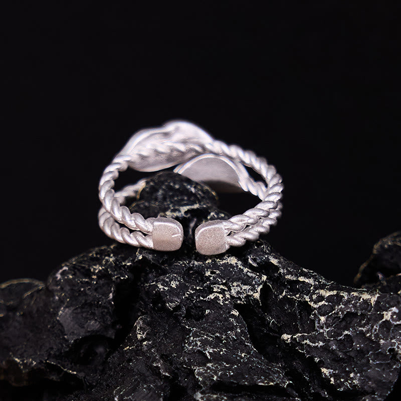 Anillo ajustable de riqueza con hoja de cobre y piedra de Buda