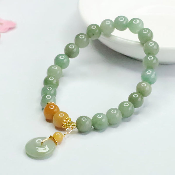 Pulsera de prosperidad y abundancia con cuentas de jade y Buddha Stones