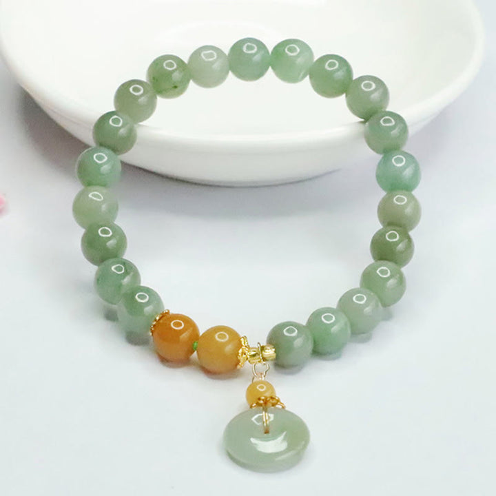 Pulsera de prosperidad y abundancia con cuentas de jade y Buddha Stones