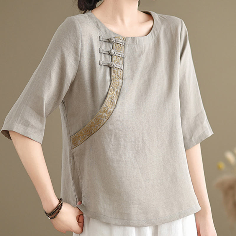 Camisa casual de manga corta con cuello redondo y botones de rana, con bordado floral y estampado de Buddha Stones para mujer. - image 1