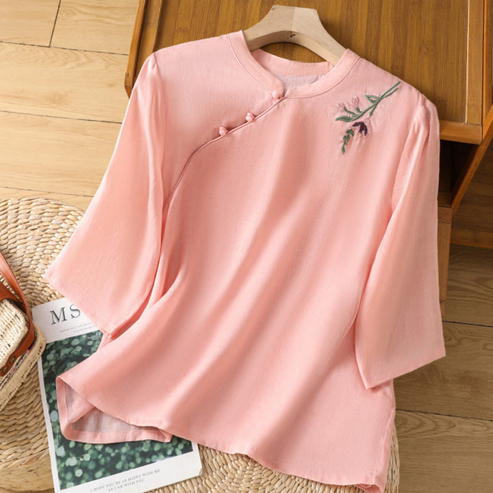 Camisa informal de lino y algodón con diseño de Buddha Stones para mujer, con flores y hojas bordadas, botones de rana, cuello redondo y media manga.