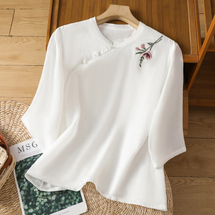 Camisa informal de lino y algodón con diseño de Buddha Stones para mujer, con flores y hojas bordadas, botones de rana, cuello redondo y media manga.
