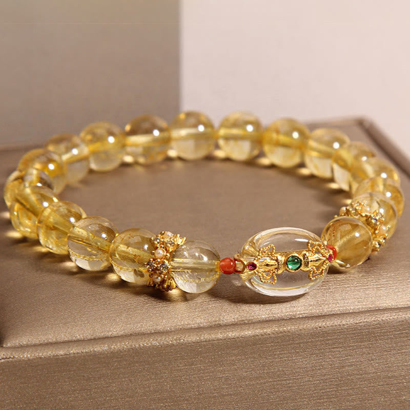 Pulsera de auspiciosidad con cuentas de cuarzo rutilado dorado natural de Buddha Stones
