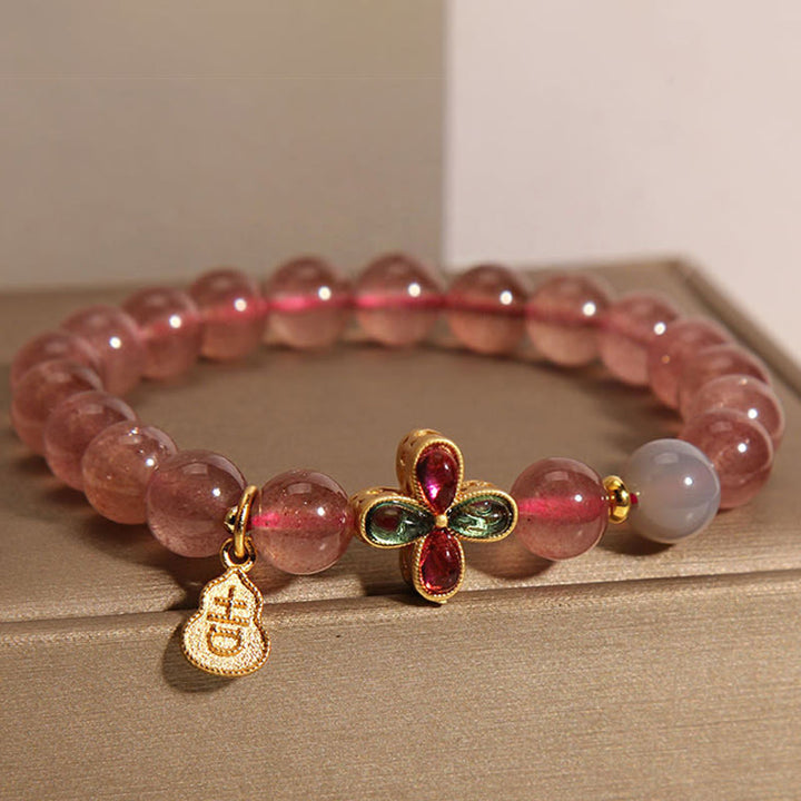 Pulsera curativa de calabaza de la suerte con trébol de cuatro hojas y cuarzo fresa de Buddha Stones