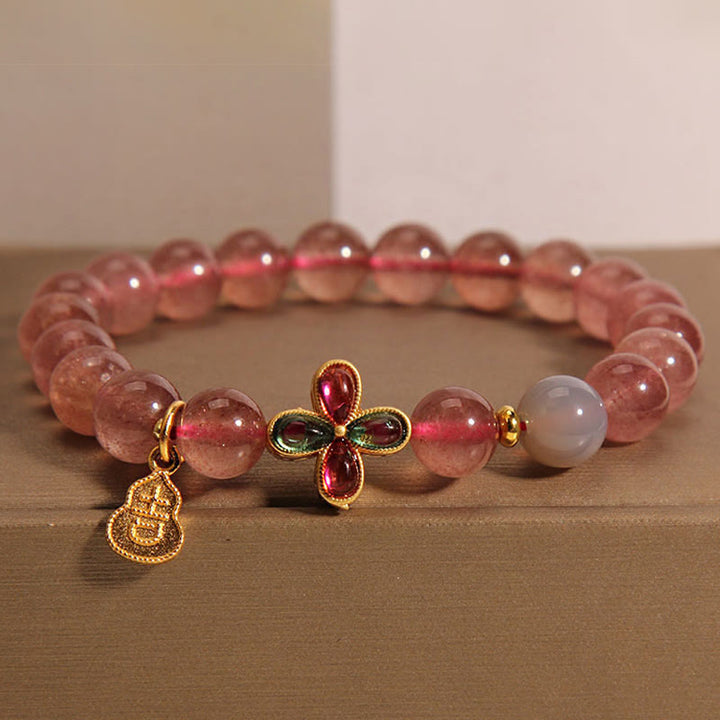 Pulsera curativa de calabaza de la suerte con trébol de cuatro hojas y cuarzo fresa de Buddha Stones