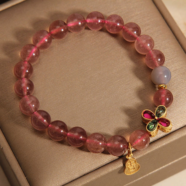 Pulsera curativa de calabaza de la suerte con trébol de cuatro hojas y cuarzo fresa de Buddha Stones