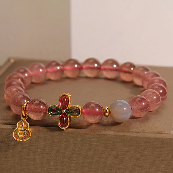 Pulsera curativa de calabaza de la suerte con trébol de cuatro hojas y cuarzo fresa de Buddha Stones