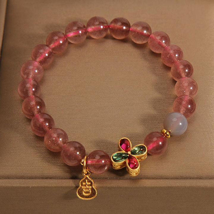 Pulsera curativa de calabaza de la suerte con trébol de cuatro hojas y cuarzo fresa de Buddha Stones