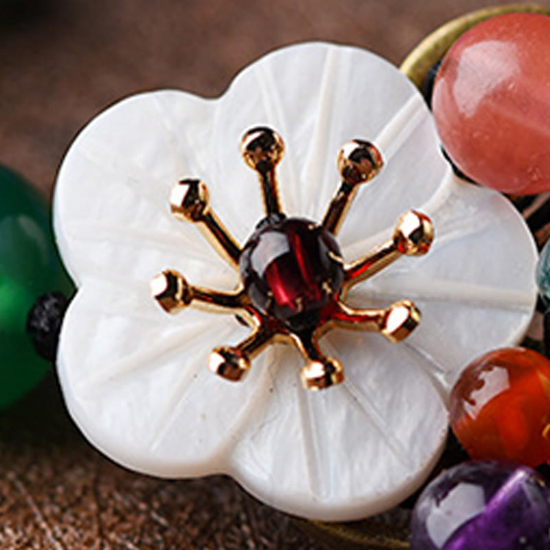 Pulsera de soporte con flor de concha de ágata y Buddha Stones