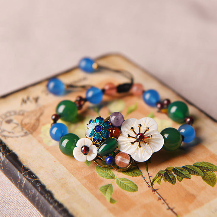 Pulsera de soporte con flor de concha de ágata y Buddha Stones