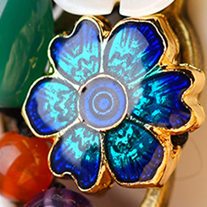 Pulsera de soporte con flor de concha de ágata y Buddha Stones