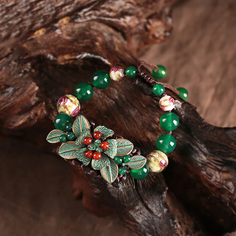 Pulsera de soporte con nudo trenzado y cuentas de flores de vidrio de ágata verde de Buddha Stones