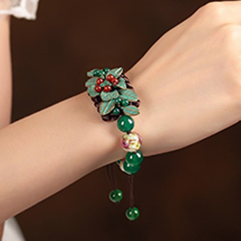 Pulsera de soporte con nudo trenzado y cuentas de flores de vidrio de ágata verde de Buddha Stones