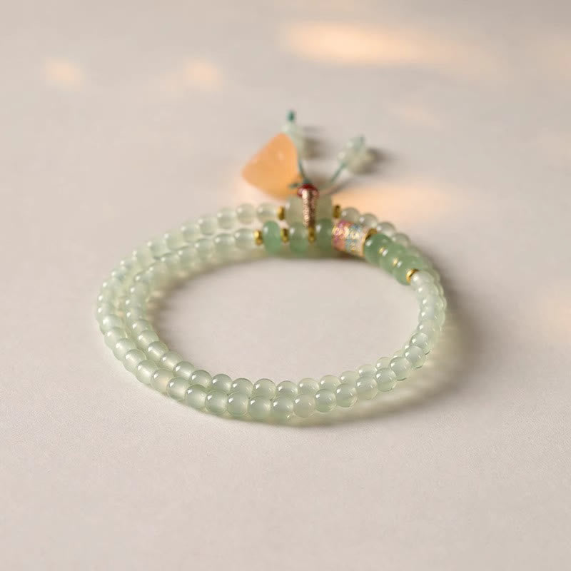 Pulsera de positividad con múltiples círculos de Buddha Stones, aventurina natural, vainas de loto y bambú de la suerte.