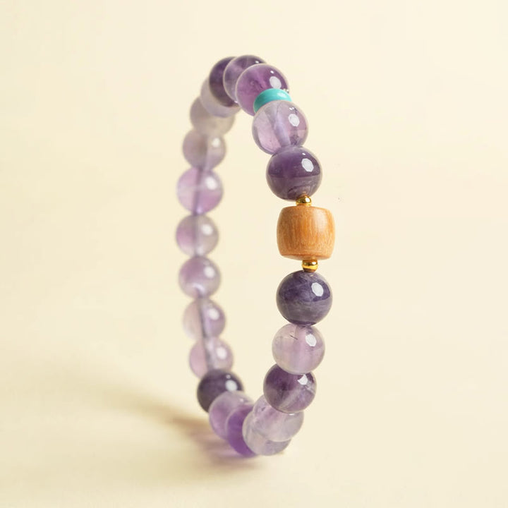 Pulsera de la paz con cuentas de madera de la suerte y amatista natural de Buddha Stones