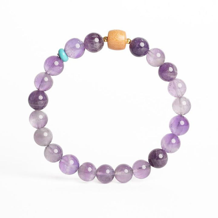 Pulsera de la paz con cuentas de madera de la suerte y amatista natural de Buddha Stones